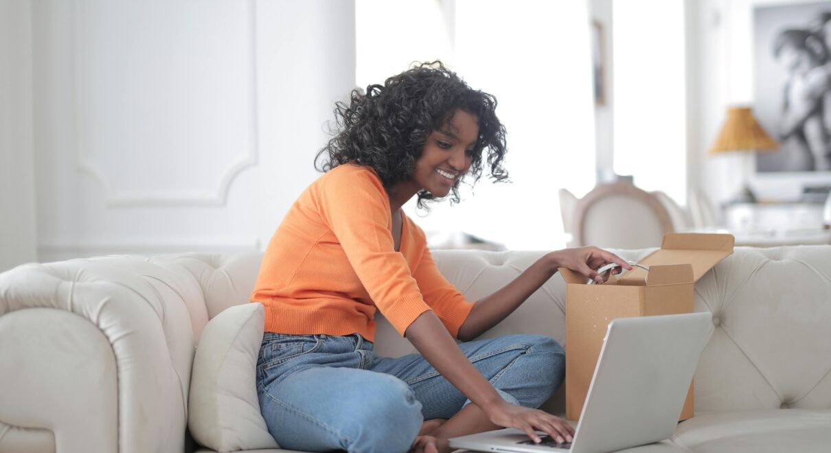 Airbnb host using smartphone to send automated guest messages